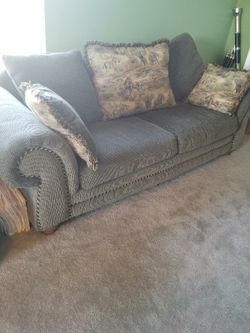 Nice Green Couch With Pillows