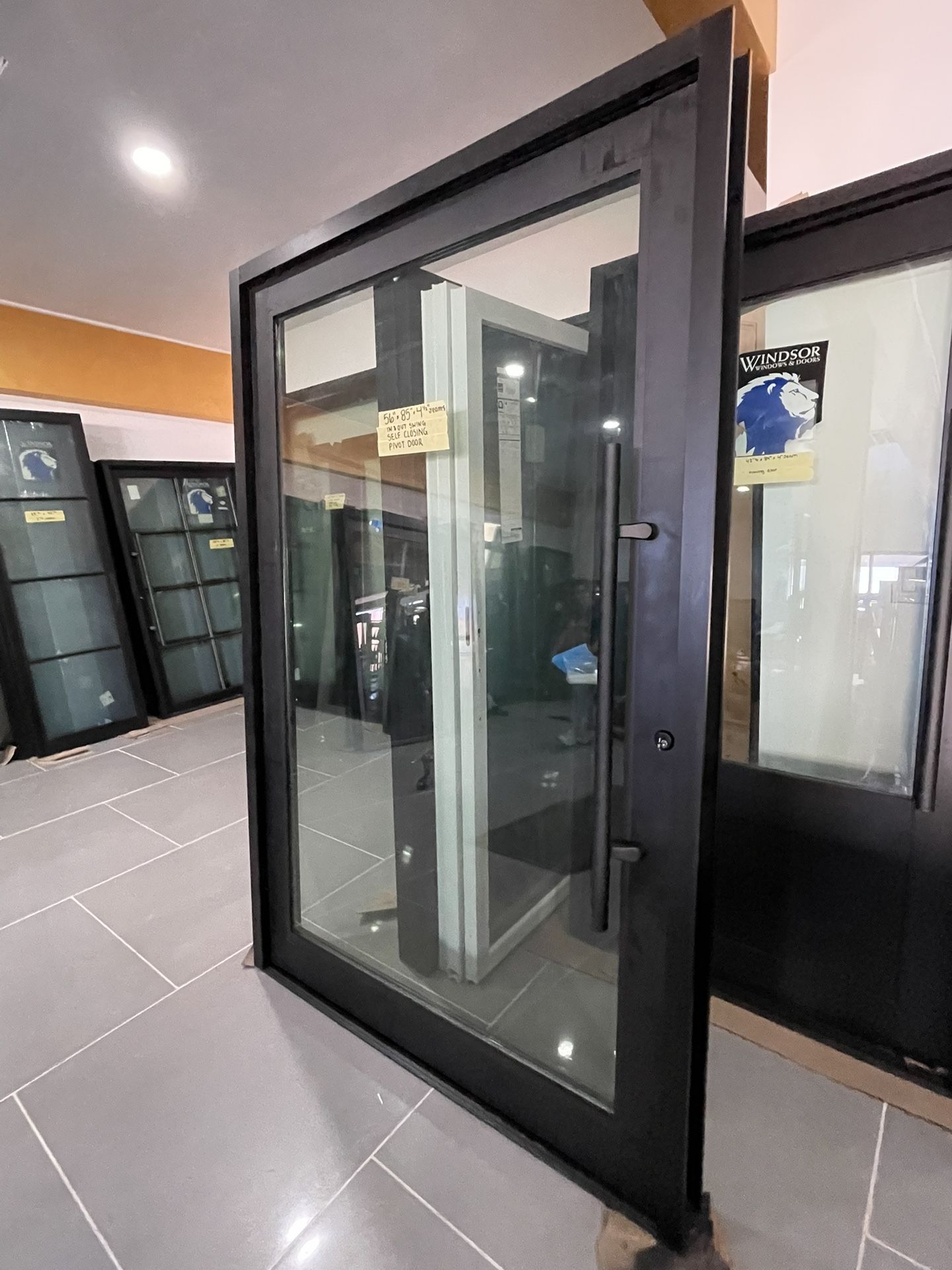 2-Pivote Glass Door 56x85 In / Out Swing  Self Closing 