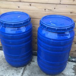 2 Blue Barrels 50gallons 