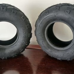 145/70-6 tubeless V-tread tires designed for use on ATVs, go-karts, and mini-bikes.