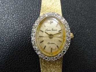 Solid 14kt Gold Vintage Lucien Piccard Diamond Bezel Watch