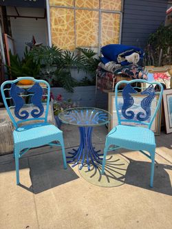 Mid Century solid iron side table with two chairs