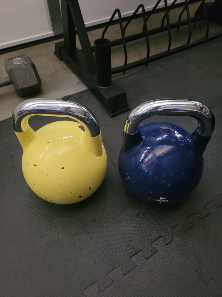 Kettlebells (1x30Lb and 1x40Lb) for $80 Firm (Walnut 91789)