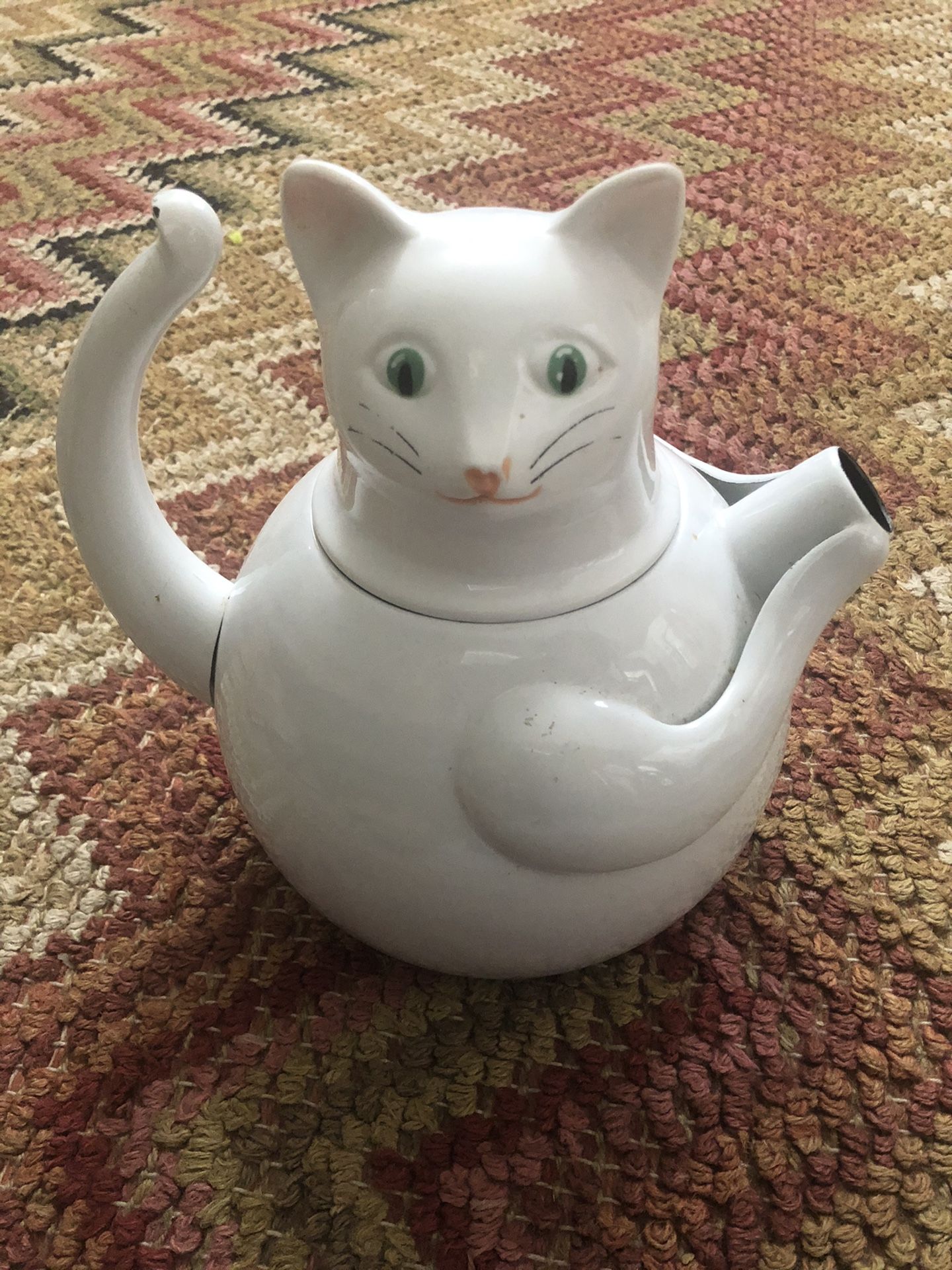 vintage White enamel steel tea kettle in the shape of a cat