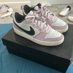 magenta/black jordan 1 lows women’s