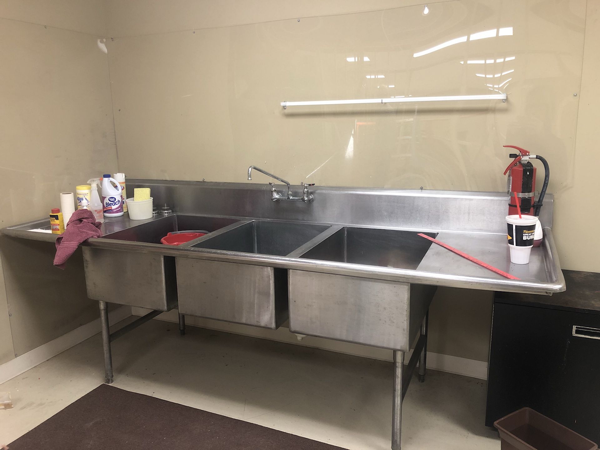 Commercial grade 3 bowl stainless steel sink.
