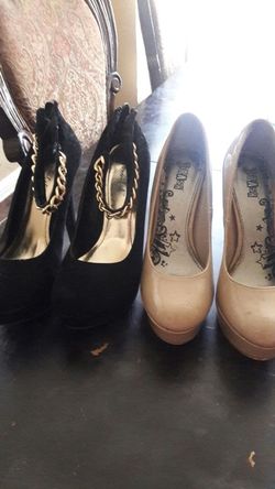 Heals size 7 and 7 1/2 black used only once brown used 3times