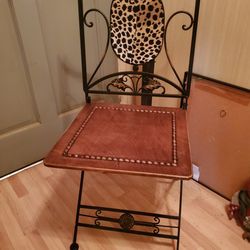 WROUGHT IRON FOLDING DECOR CHAIR W/ WOOD SEAT.  37" TALL to back. 18 1/2" TALL to seat.  16" WIDE x 16" DEEP 