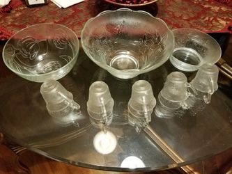 Punchbowl set includes, 3 larger bowls, 5 smaller bowls and ten cups - $20