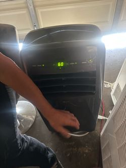 Lg portable air conditioner 12,000 BTUs shoot me an offer