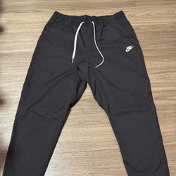 black nike tech pants 