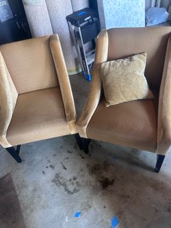 Tan color chairs .