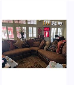 Brown Sectional Sofa with Decorative Pillows