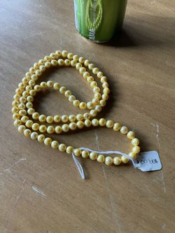 genuine Long Strand of Pearls 36”. These are real pearls color enhanced. Rochester wa