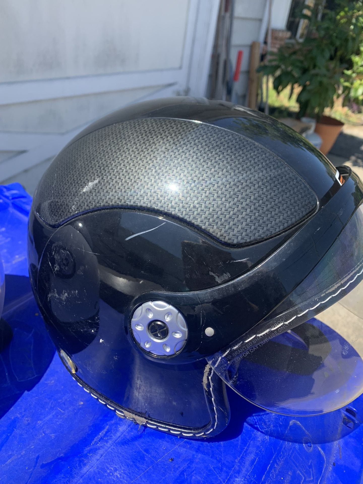Two. Motorcycle helmets.