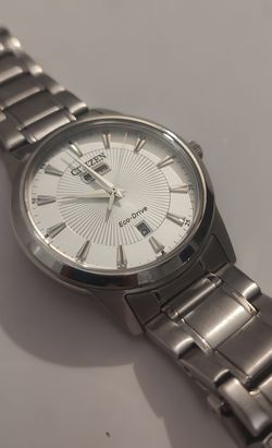 Citizen Eco-Drive Silver Dial Day Date Women's Watch 
