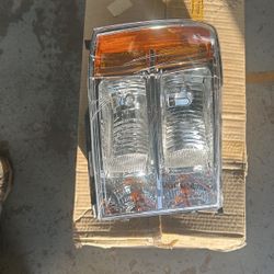 GMC Sierra Headlight 