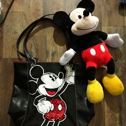 new Mickey Mouse tote bag with a large Mickey Mouse plush in perfect condition