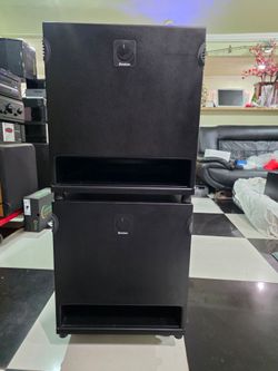 Boston Acoustic BT1100 Powered Subwoofer 300 watts RMS 12" down firing. Excellent condition perfect working amazing sound will test before you buy. 
N