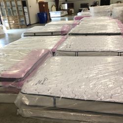 Twin size of a full size mattress sets for $250 per Set             side