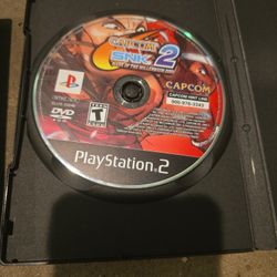 PS2 Slim, Capcom Vs Snk2, And One Original Ps2 Remote