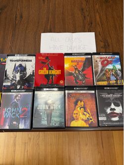 8 4K UHD Movie Lot (all cases have damaged) Crouching Tiger Hidden Dragon, The Dark Knight, How to Train Your Dragon 2, The Wizard of Oz, John Wick 1
