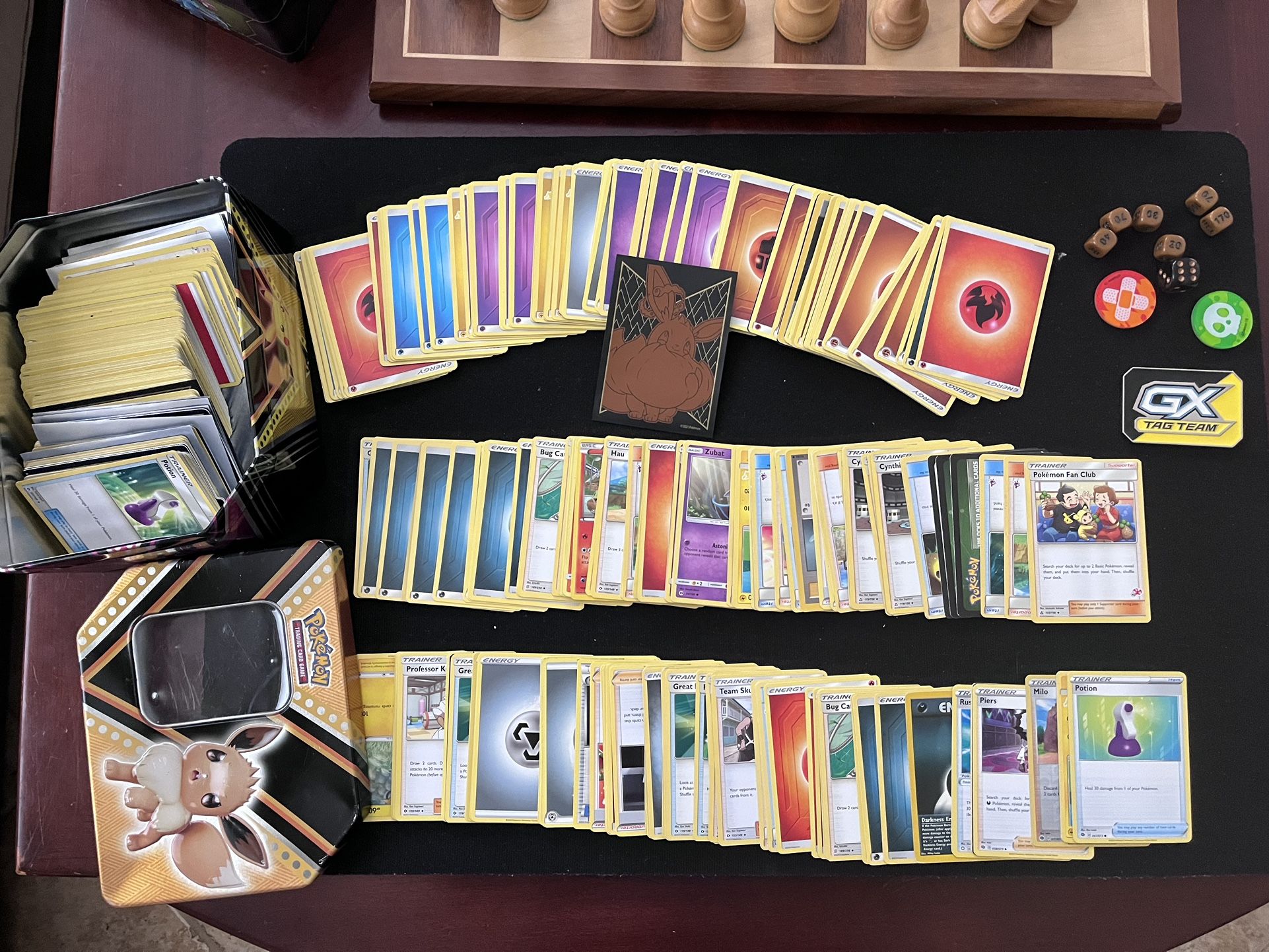 Pokémon cards, dice, and gameboard