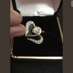 14k double Spinning heart ring size 8 with Diamonds