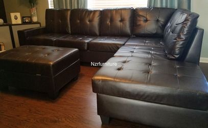 BRAND NEW BLACK BONDED LEATHER SECTIONAL SOFA WITH OTTOMAN