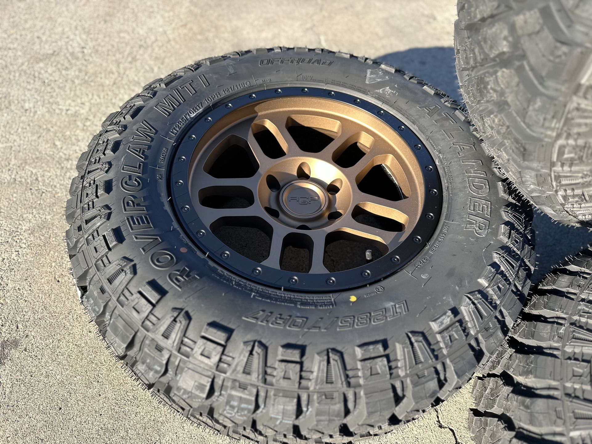 17” Gold Wheels Rims and Tires Chevy Silverado Tahoe Suburban GMC Sierra Yukon Denali LT285/70R17 MT