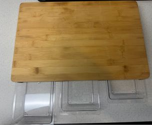 Cutting board with removable trays