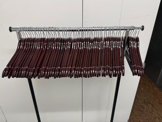 Wooden clothes hangers (61 hangers) $50 obo