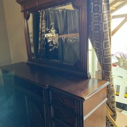 Cherry wood dresser super heavy with mirror needs a little TLC but awesome piece