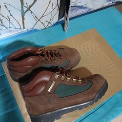 Timberland Field boots feature a mixed-media design with premium leather and durable mesh fabric. 