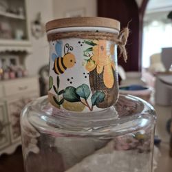 Hand designed decoupaged bee jar with lid.