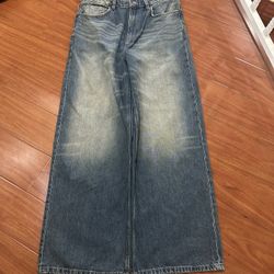 super baggy faded blue jeans