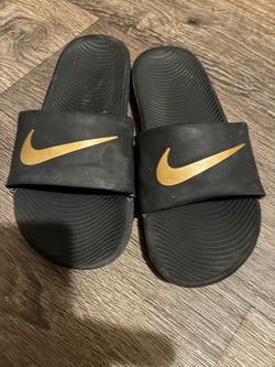 Nike Slide Sandals Black and Gold
