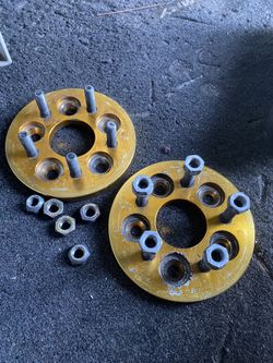 (2) 15 mm 5x100 extended studs (w/ lug nuts) 