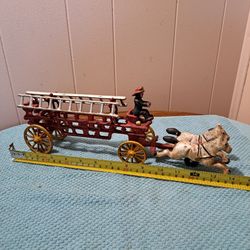 Old Vintage Cast Iron Two Horse Drawn Hook and Ladder Fire Wagon Toy.
