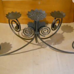  large PartyLite Hearthside Leaf Viking Pillar Holder. It is 27" L x  11" H x 15" W and has 6 leaf stands to hold 6 pillar candles.