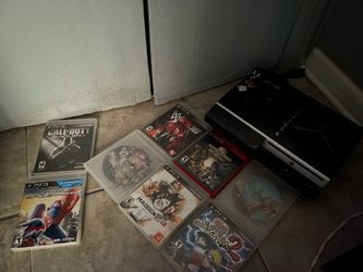 80GB PlayStation 3 with 8 games and 2 controllers