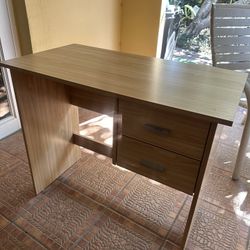Wooden desk with drawers