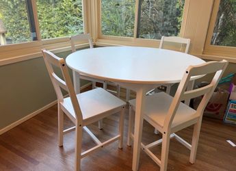 White IKEA dining table and chairs
