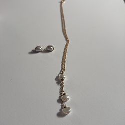Faux pearls on gold tone chain with earrings