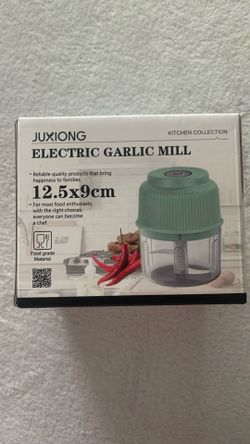 Electric garlic mill