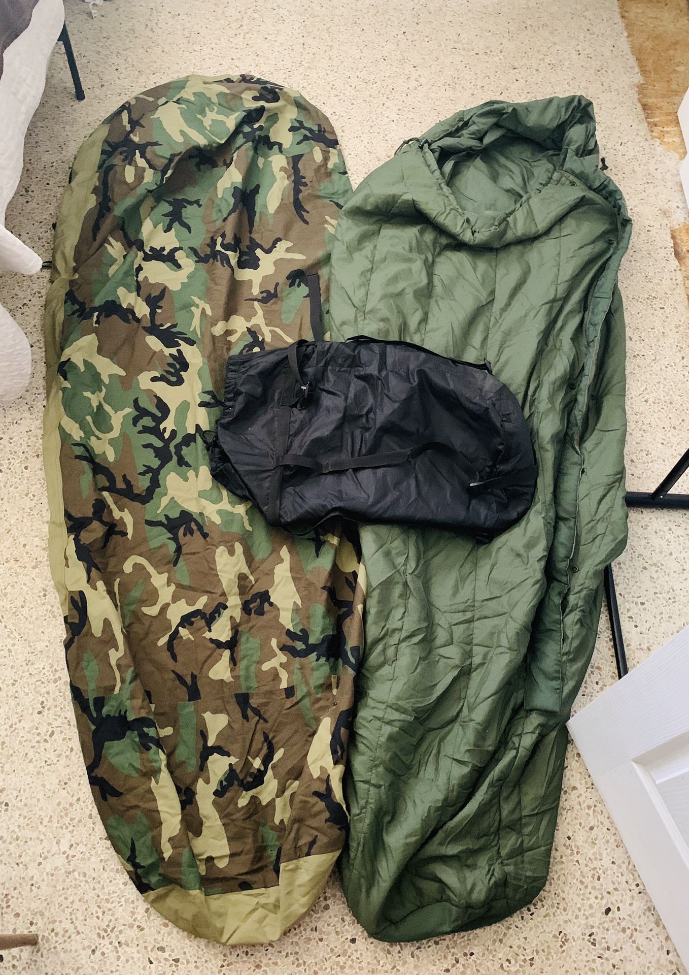 Sleeping bag and waterproof shell (needs small patch)