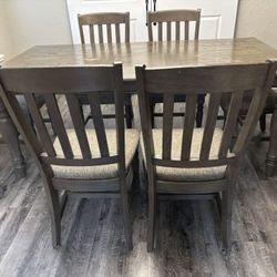 Big table with 6 chairs, great condition, slight water damage on top
