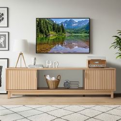 2453a $120  EROMMY 58/70 inch Mid Century Modern TV Stand with Fluted Doors, Entertainment Center with Power Outlet & Cable Management - 58''  Perfect
