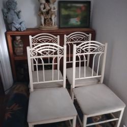 Four Metal Chairs (One Has Damage)