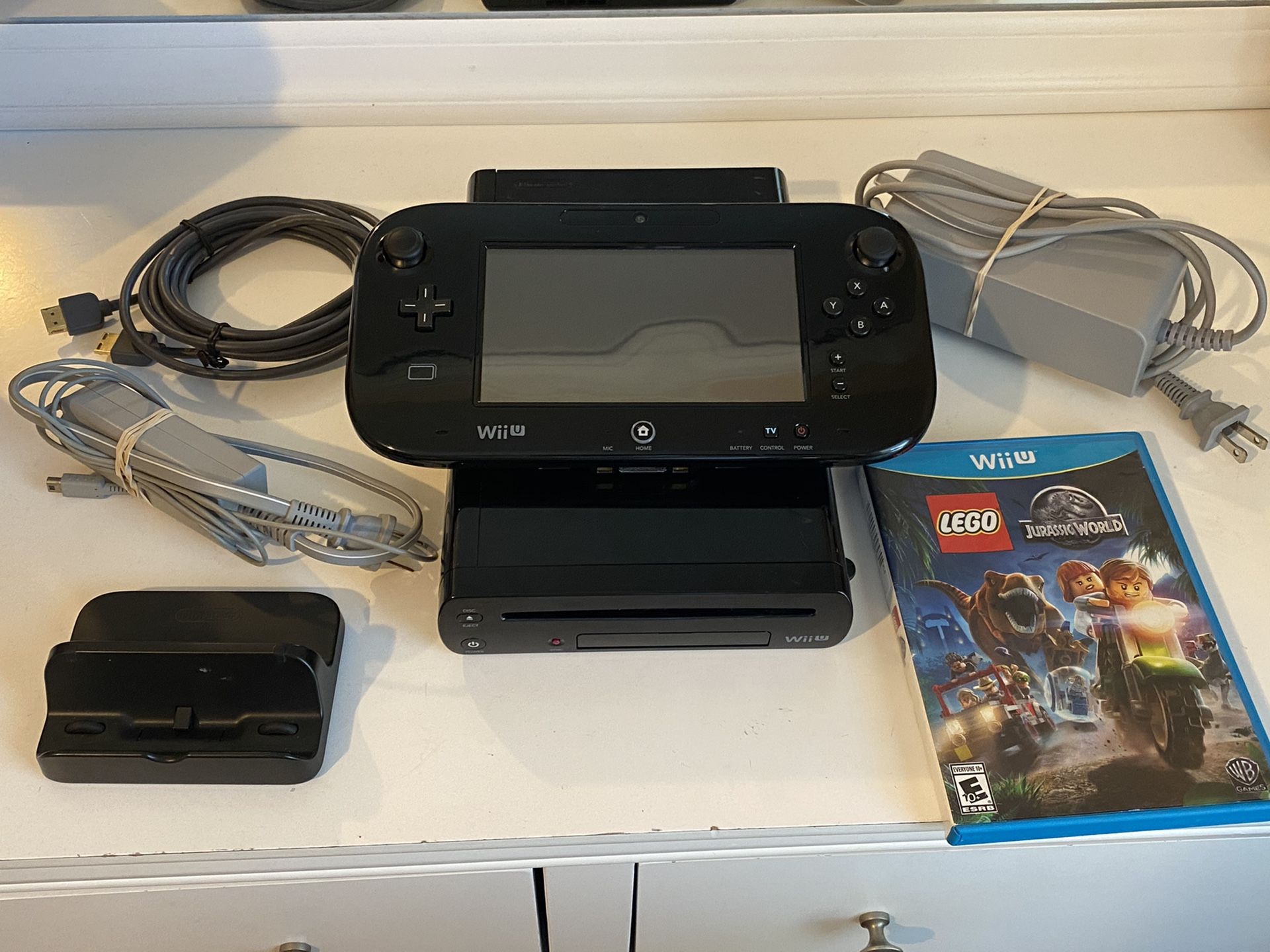 nintendo wii u with 6 pokemon games already downloaded and several other games. in very awesome working condition.